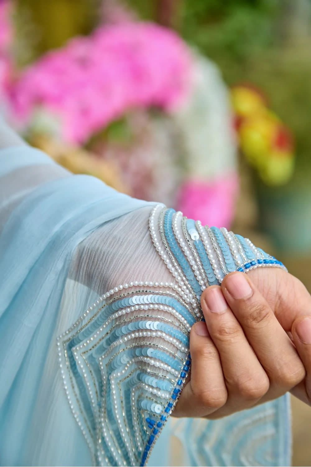 SKY BLUE CELEBRITY STYLE PEARL HANDWORK SAREE
