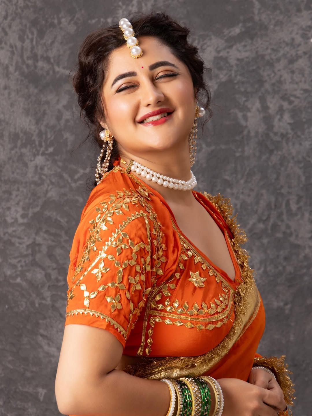 Orange Love Rashmi Desai Inspired Hand Charkhi Gotta Patti Saree