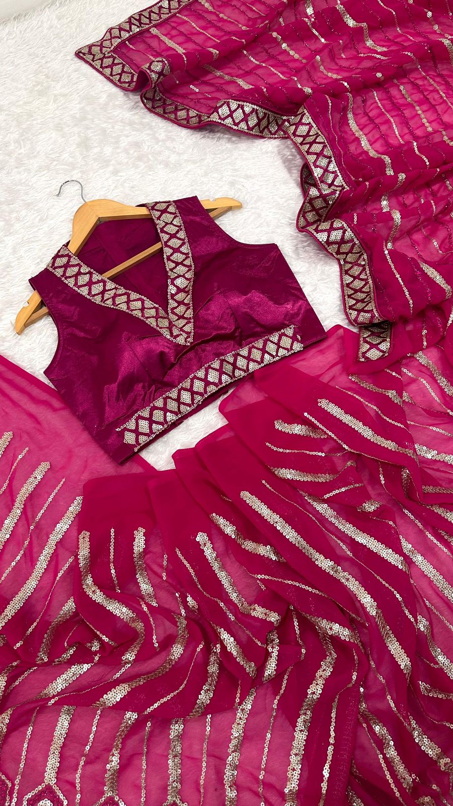 Wrapped in pink dipped in shine sequins saree