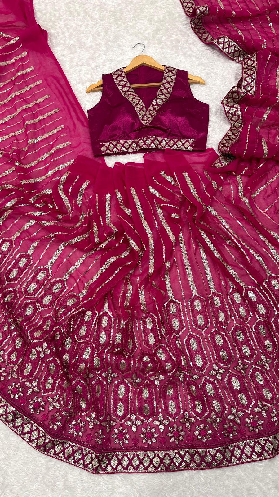 Wrapped in pink dipped in shine sequins saree