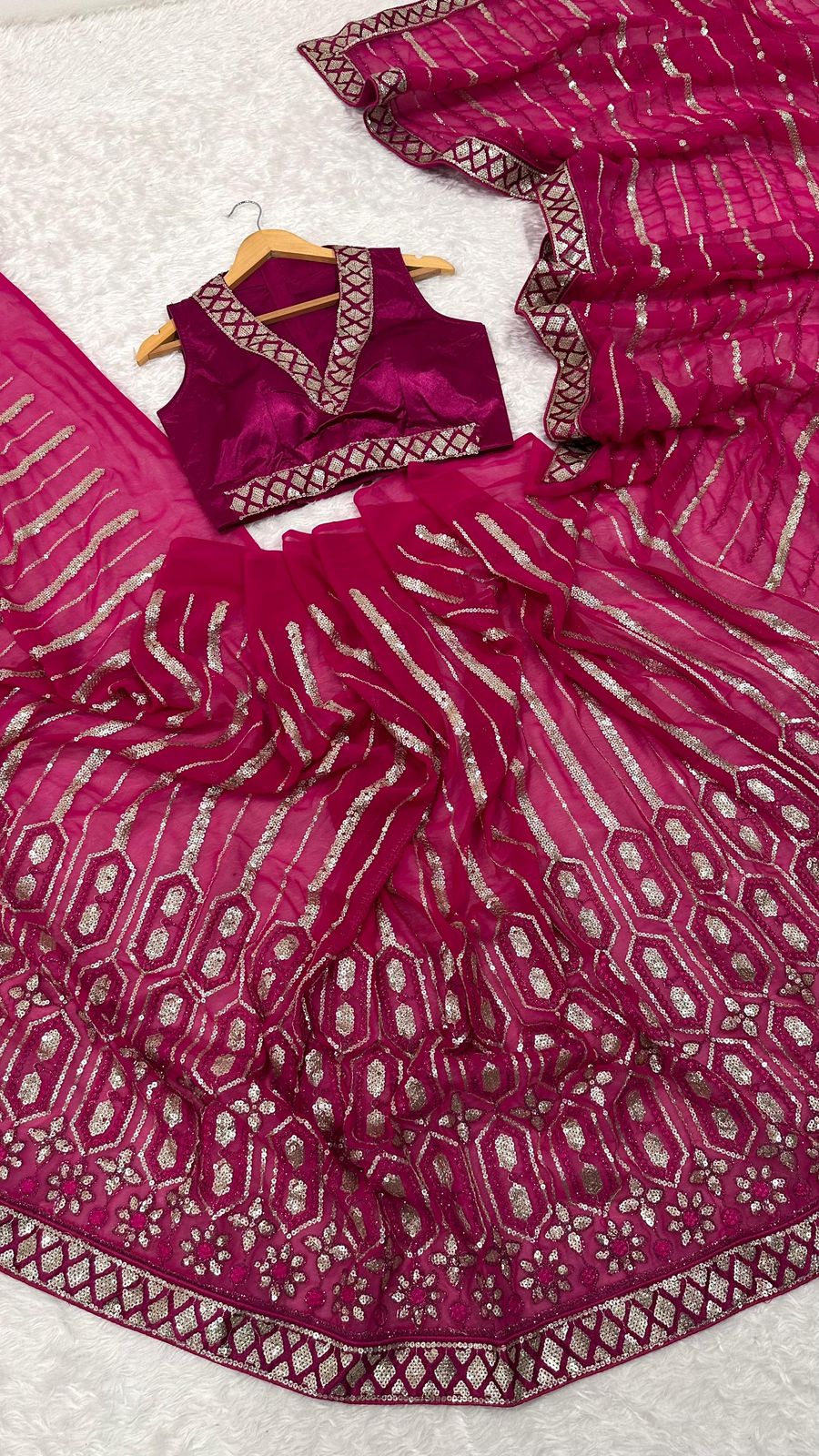 Wrapped in pink dipped in shine sequins saree