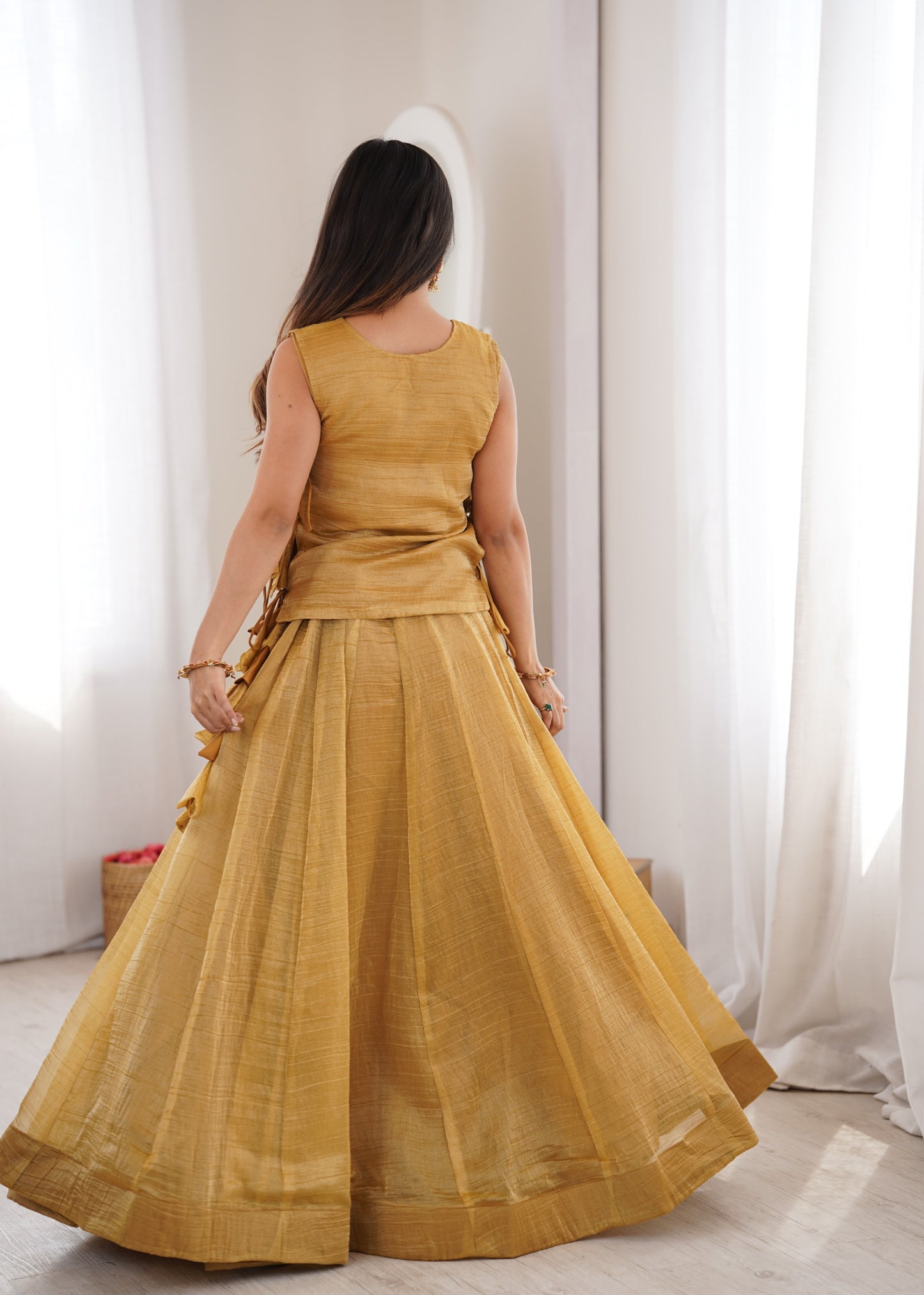 Salsa Crush lehenga paired with an intricately embroidered Koti Jacket