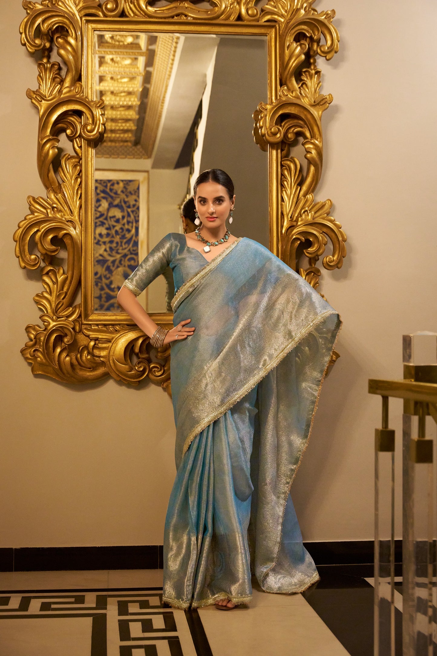 Shimmering in Zari Sequins Premium Pastal Saree