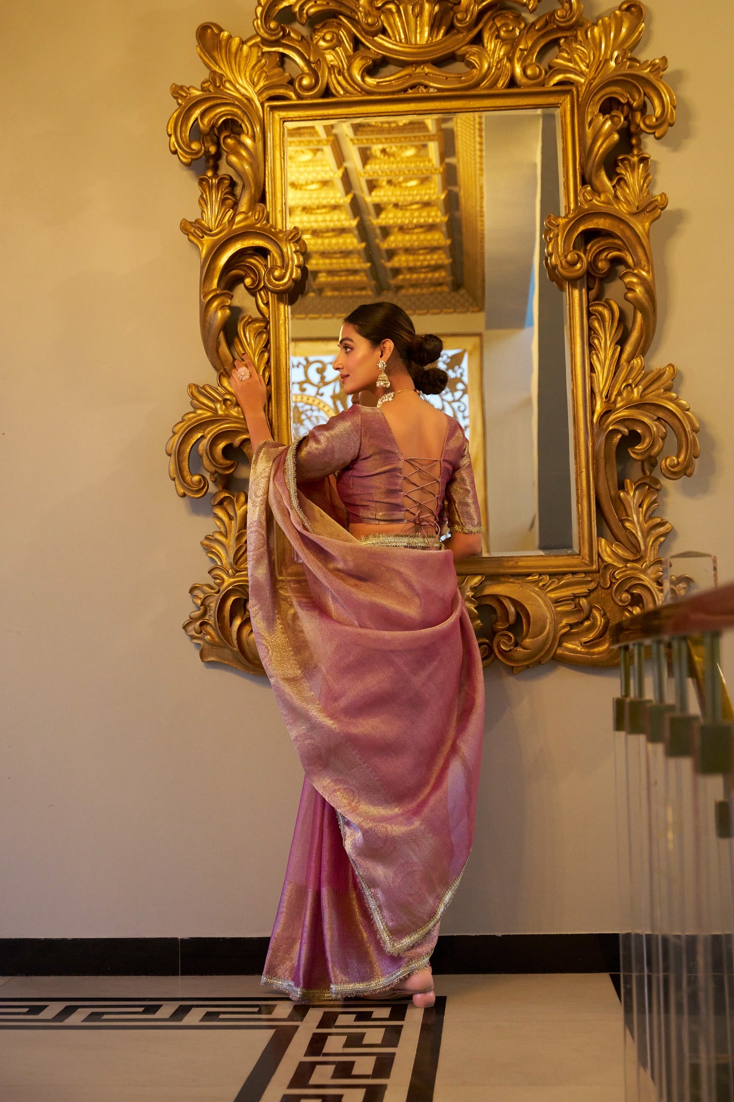 Shimmering in Zari Sequins Premium Pastal Saree