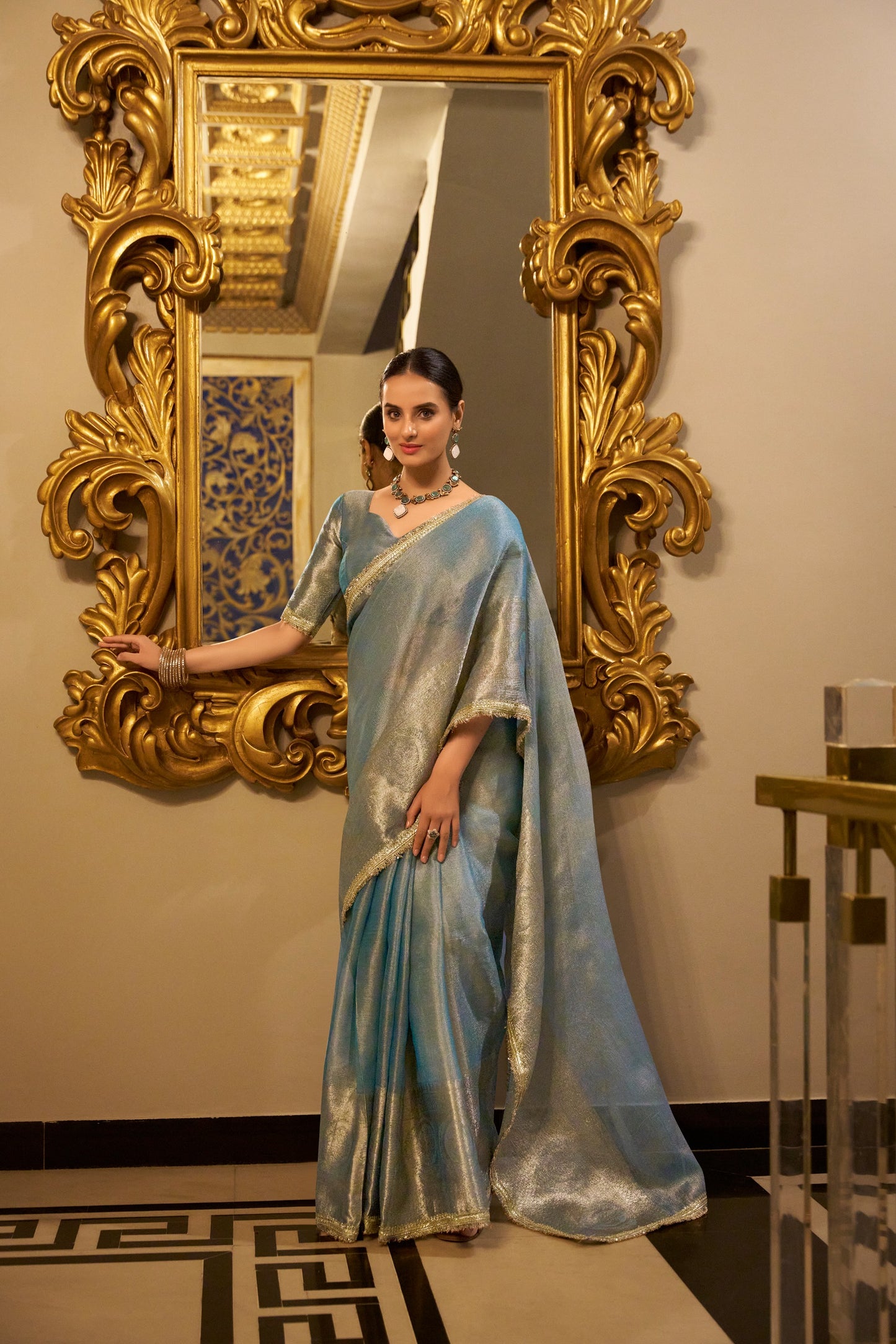 Shimmering in Zari Sequins Premium Pastal Saree